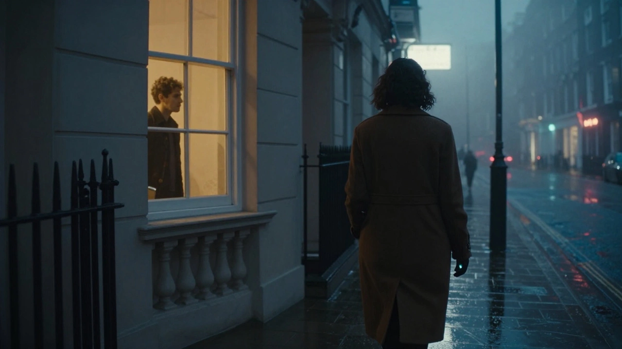 A woman walks away from a London townhouse at night, her silhouette framed by warm light and rain-slicked streets.